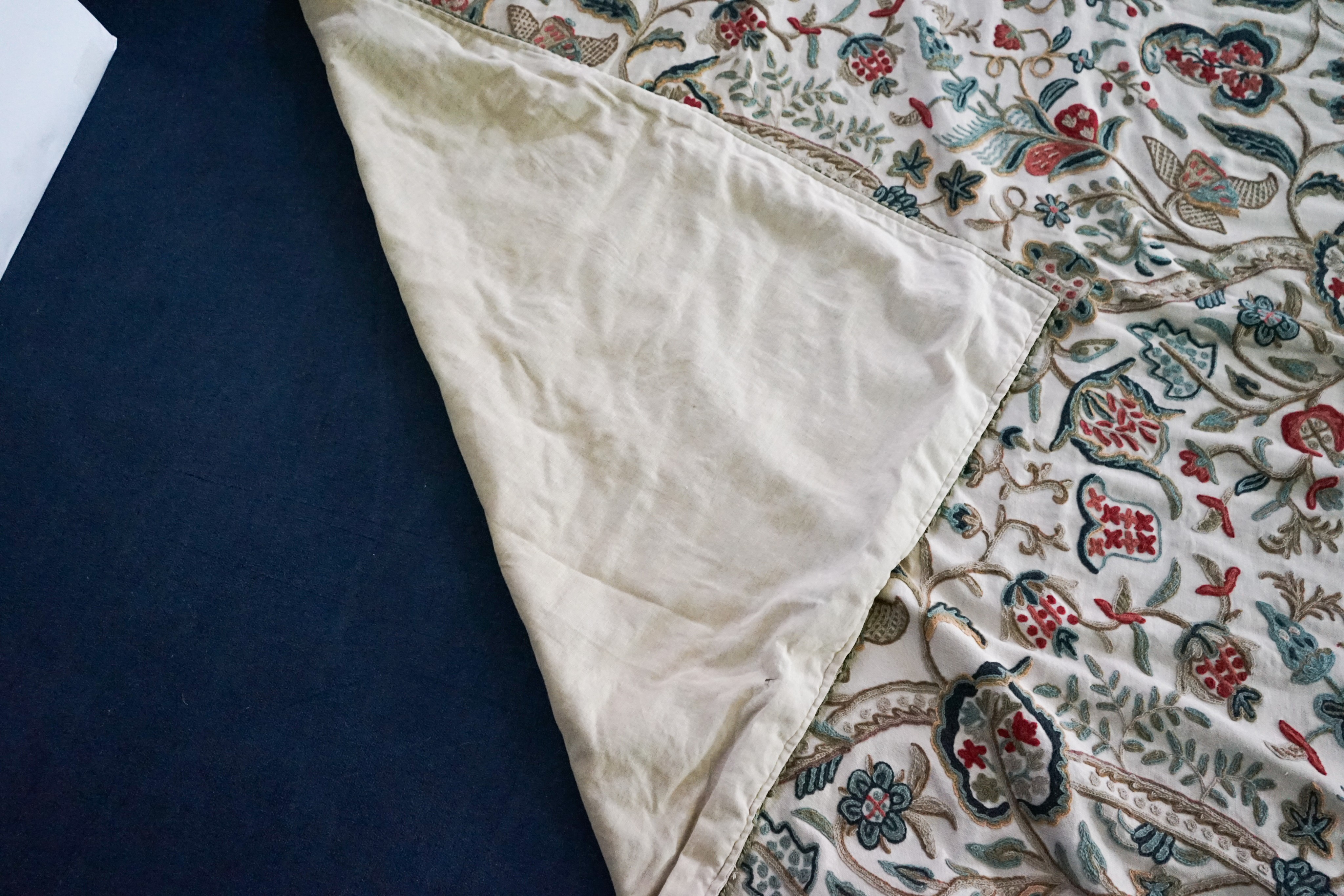 A Chelsea Textiles crewel work double bed spread, 550 x 260cm